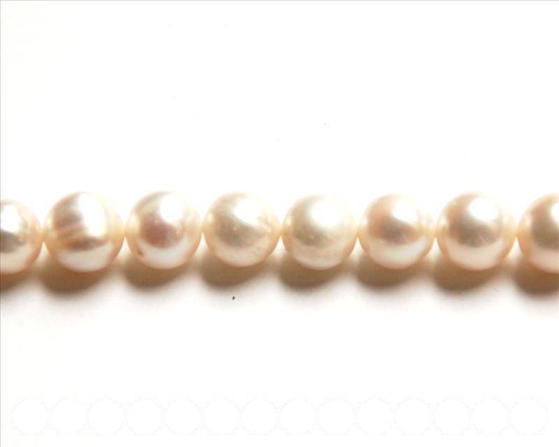 Cultured Freshwater. Round, 10-11mm. 34 Ud.