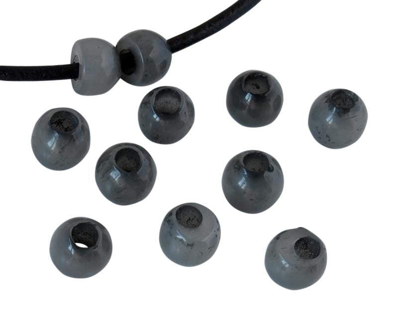 Round Resin 7x7x5mm. Opaque grey. Inn.3mm aprox. Best Quality.