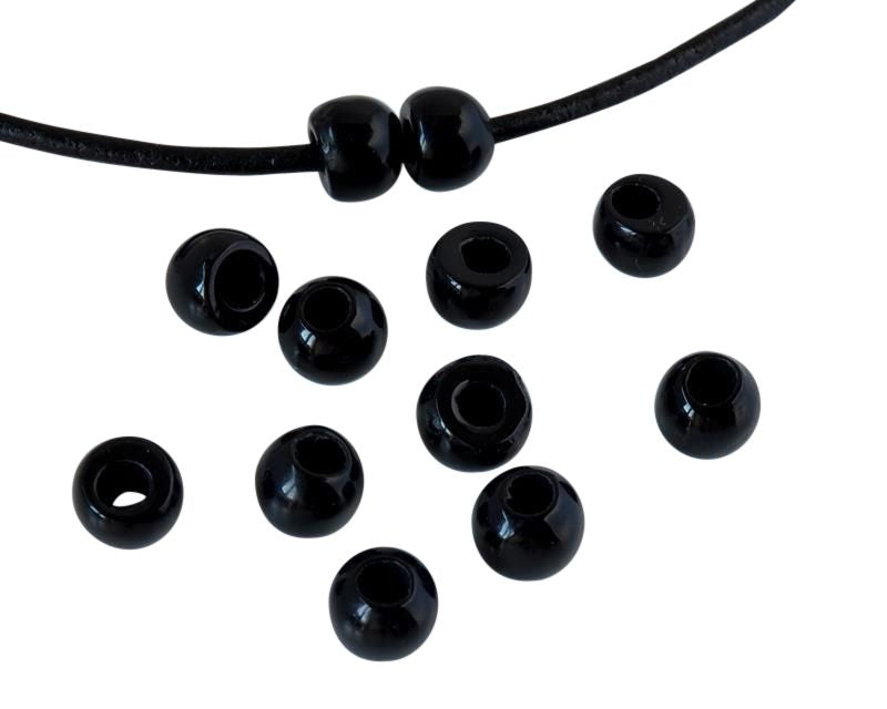 Round Resin 7x7x5mm. Opaque black. Inn.3mm aprox. Best Quality.