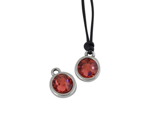 Swarovski and metal pendant coin 9x5x9.5mm. Silver-Padapradcha. Inn1.8mm