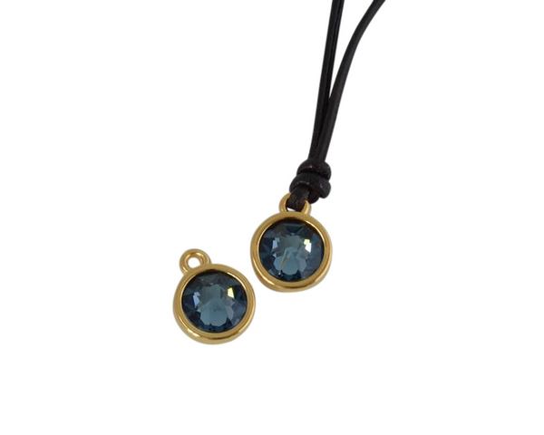 Swarovski and metal pendant coin 9x5x9.5mm. Gold-Denim Blue. Inn1.8mm