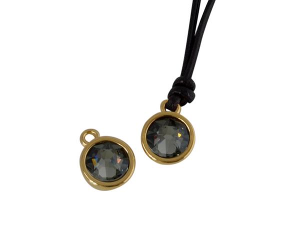 Swarovski and metal pendant coin 9x5x9.5mm. Gold-Black Diamond. Inn1.8mm