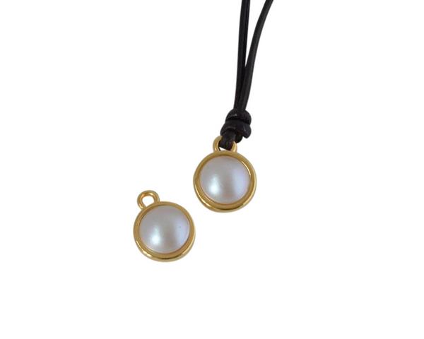 Swarovski and metal pendant coin 9x5x9.5mm. Gold-Grey Light Pearl. Inn1.8mm