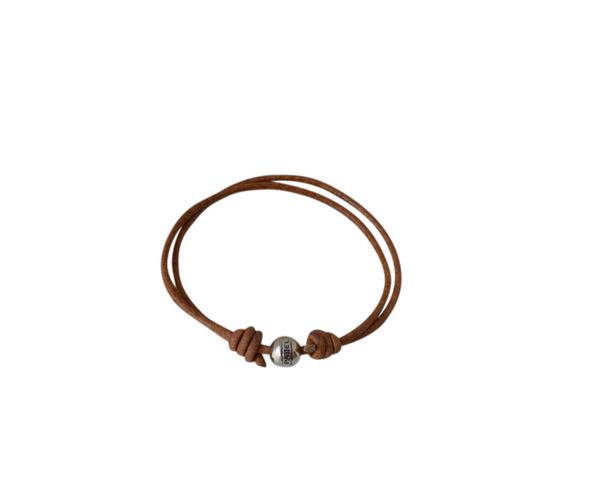 Paddle bracelet with 2mm leather and adjustable. Natural. Best Quality