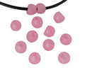 Round Resin 7x7x5mm. Opaque pink. Inn.3mm aprox. Best Quality.