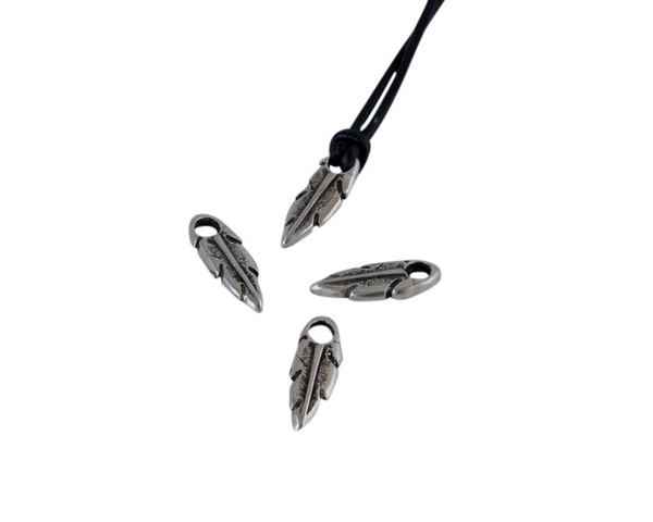 Feather pendant Zamak 13x5mm. Silver. Int.2mm