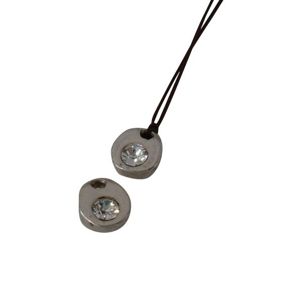 Swarovski pendant 9x8x5mm. Silver-cristal. Int.1.2mm